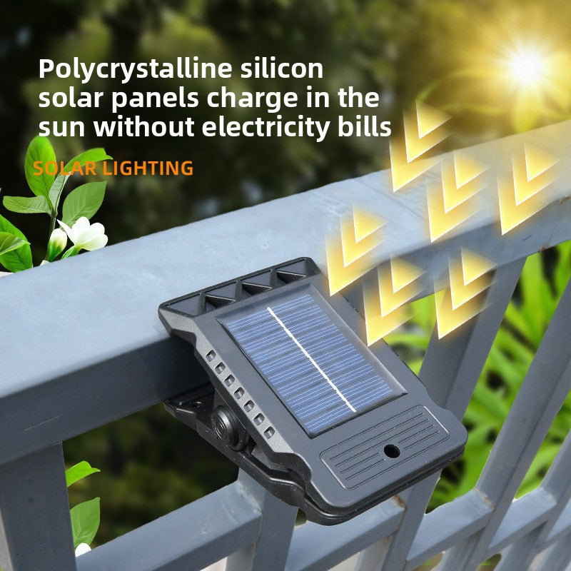 Solar powered motion sensor clip light for outdoor walls